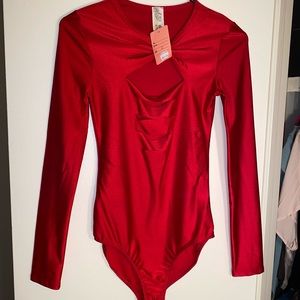 Silky red body suit with cut outs